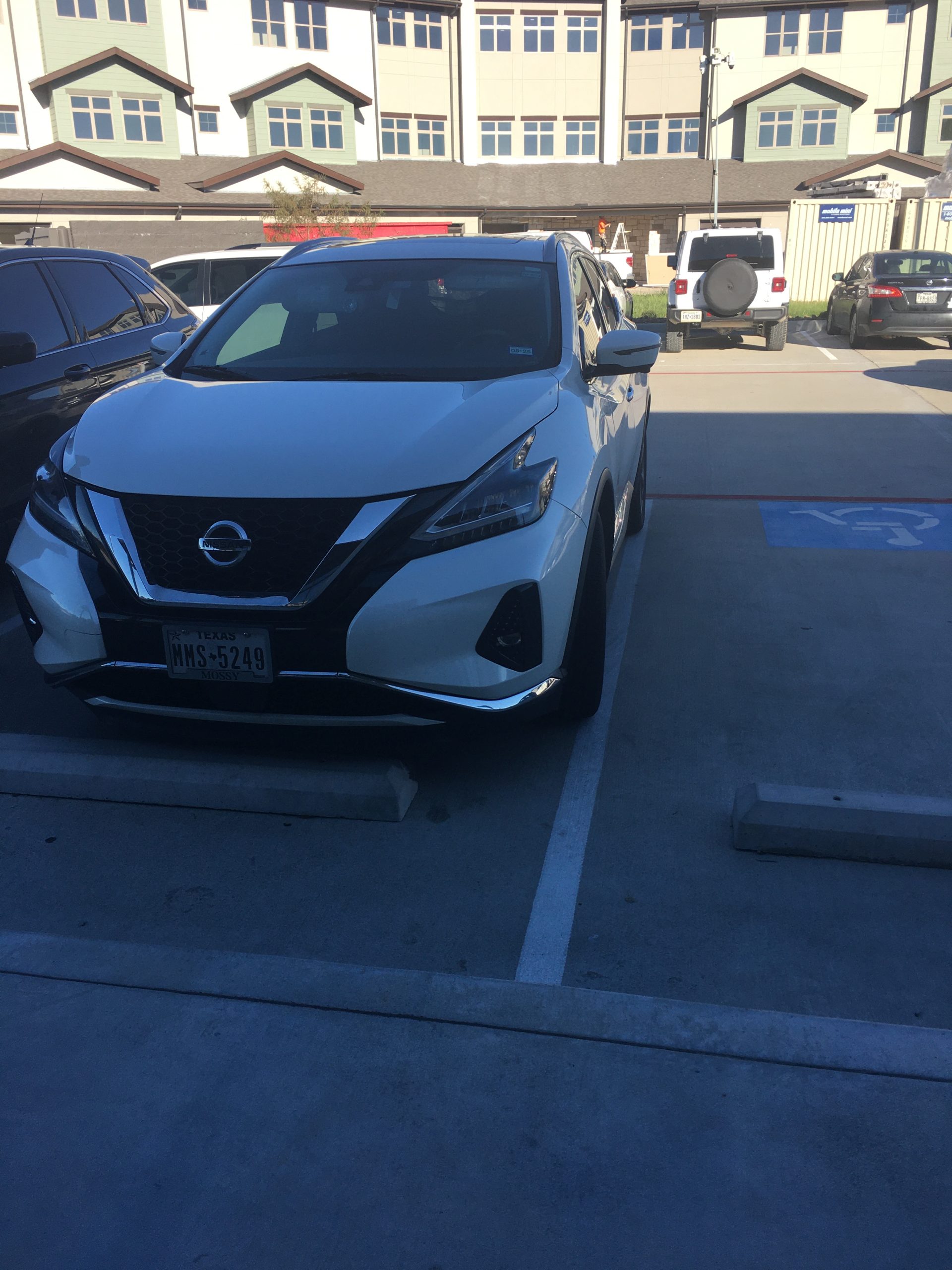 Parking Lot Violation over white line.